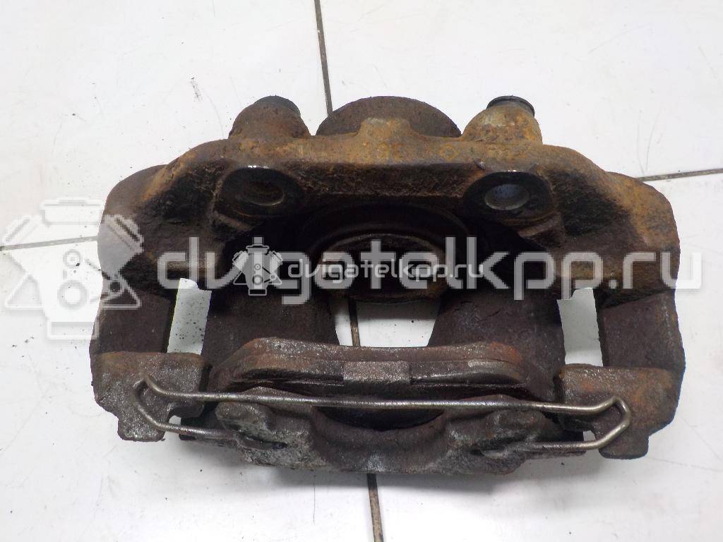 Фото Суппорт тормозной передний правый  90487043 для Opel Calibra A 85 / Astra / Kadett / Vectra / Ascona , {forloop.counter}}