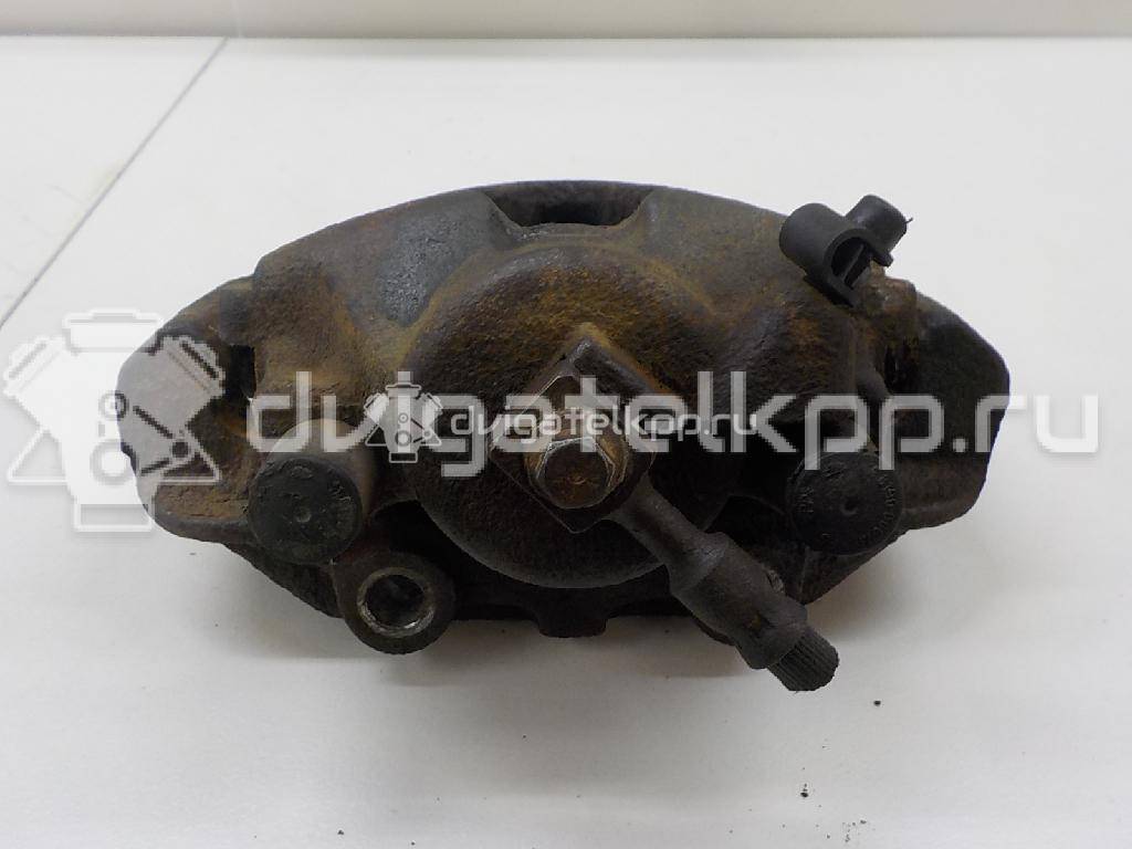Фото Суппорт тормозной передний правый  90487043 для Opel Calibra A 85 / Astra / Kadett / Vectra / Ascona , {forloop.counter}}