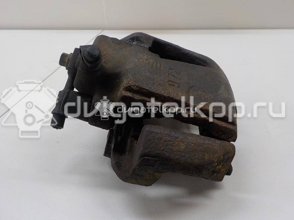 Фото Суппорт тормозной передний правый  90487043 для Opel Calibra A 85 / Astra / Kadett / Vectra / Ascona , {forloop.counter}}