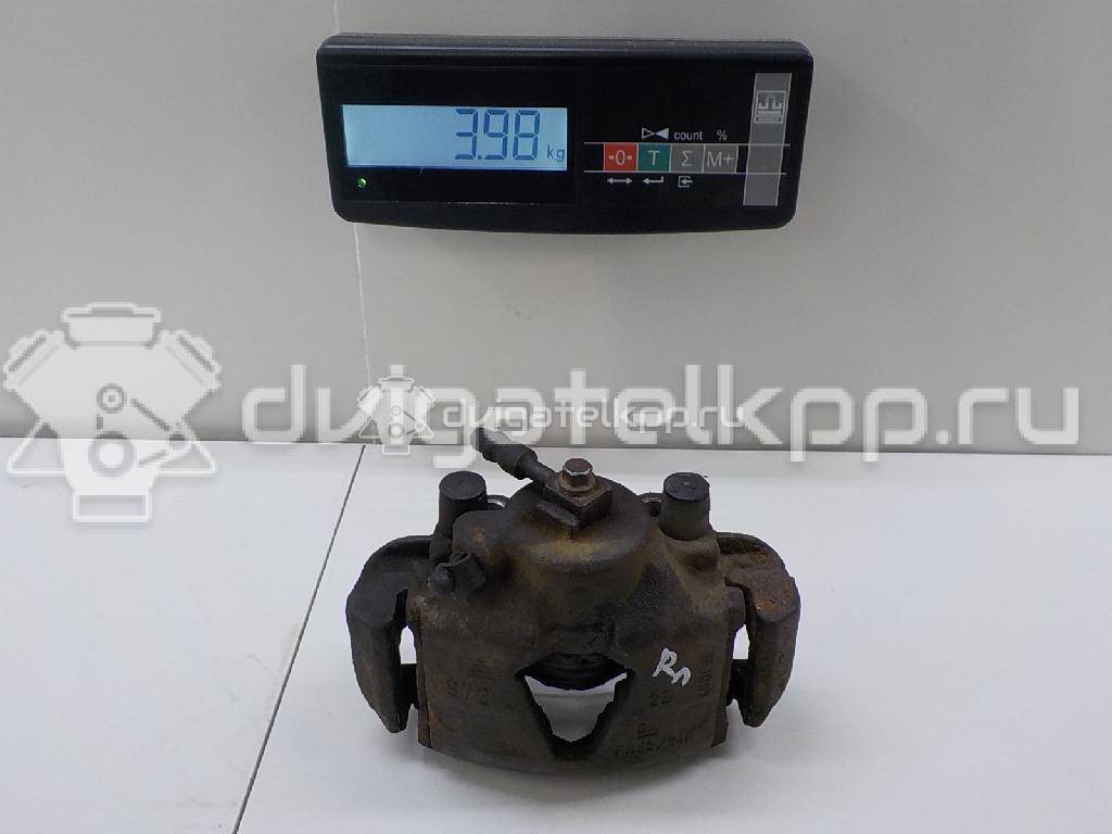 Фото Суппорт тормозной передний правый  90487043 для Opel Calibra A 85 / Astra / Kadett / Vectra / Ascona , {forloop.counter}}