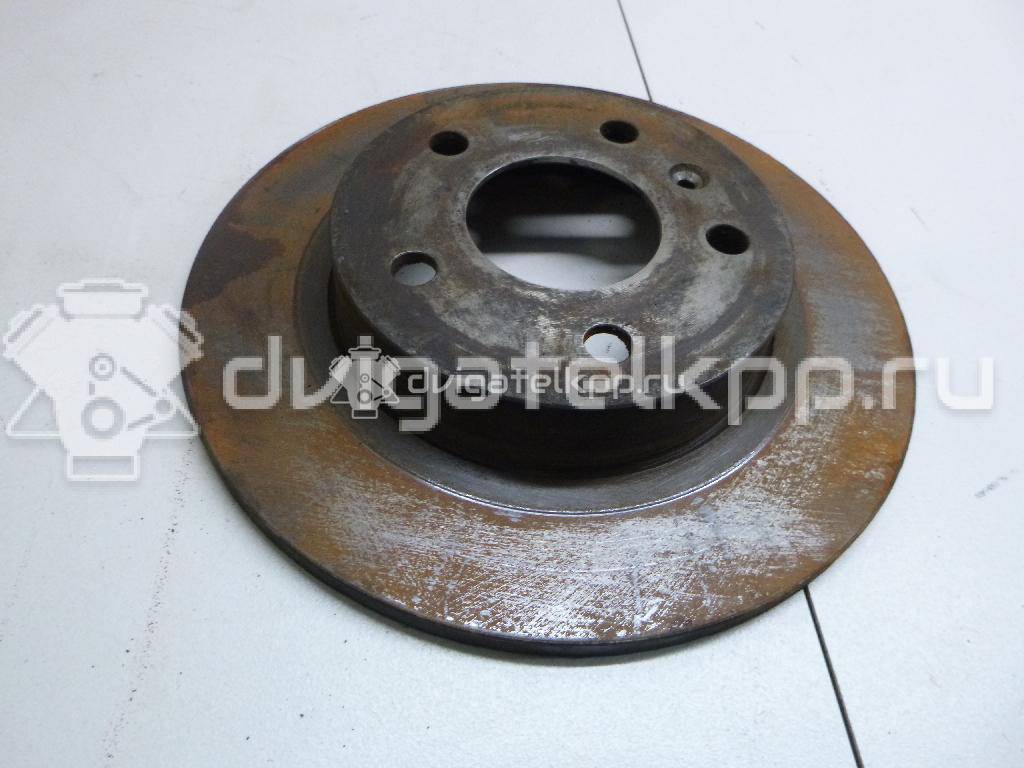 Фото Диск тормозной задний  9117772 для Opel Astra / Corsa / Combo / Zafira / Meriva {forloop.counter}}