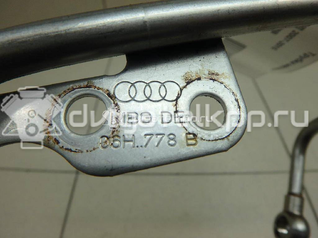 Фото Трубка масляная для двигателя CDNC для Audi A5 211 л.с 16V 2.0 л бензин 06H145778B {forloop.counter}}