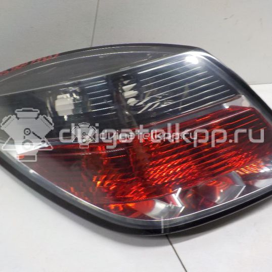 Фото Фонарь задний левый  1222117 для Opel Astra