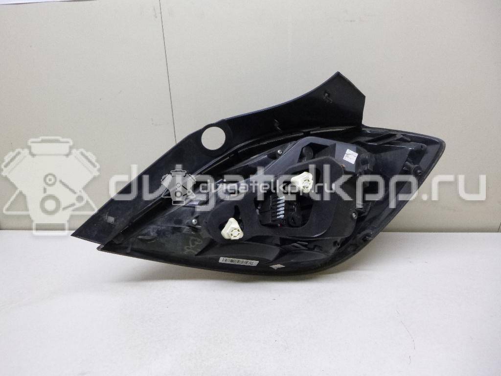 Фото Фонарь задний левый  93190306 для Opel Astra {forloop.counter}}