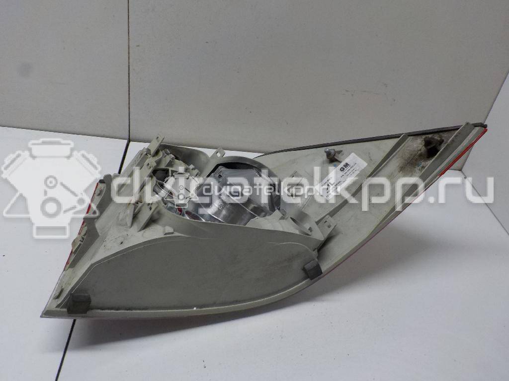 Фото Фонарь задний левый  93345893 для Opel Astra {forloop.counter}}
