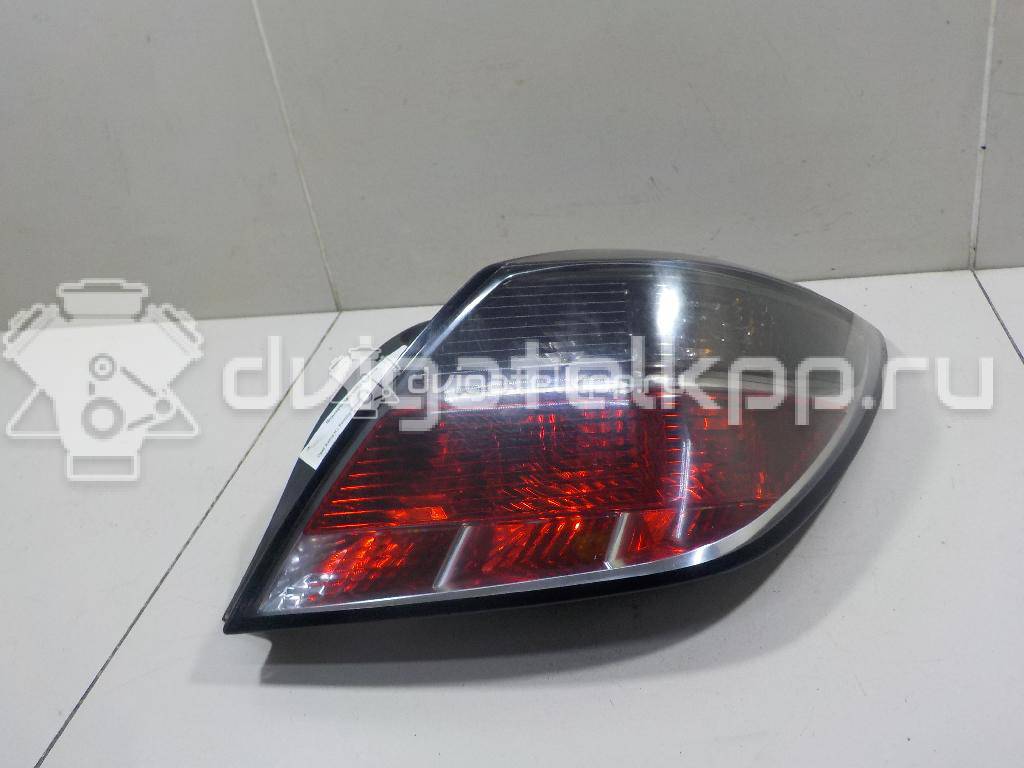 Фото Фонарь задний правый  1222118 для Opel Astra {forloop.counter}}