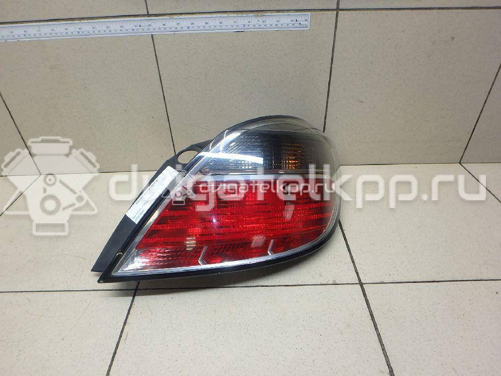Фото Фонарь задний правый  93190307 для Opel Astra {forloop.counter}}
