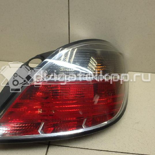 Фото Фонарь задний правый  93190307 для Opel Astra
