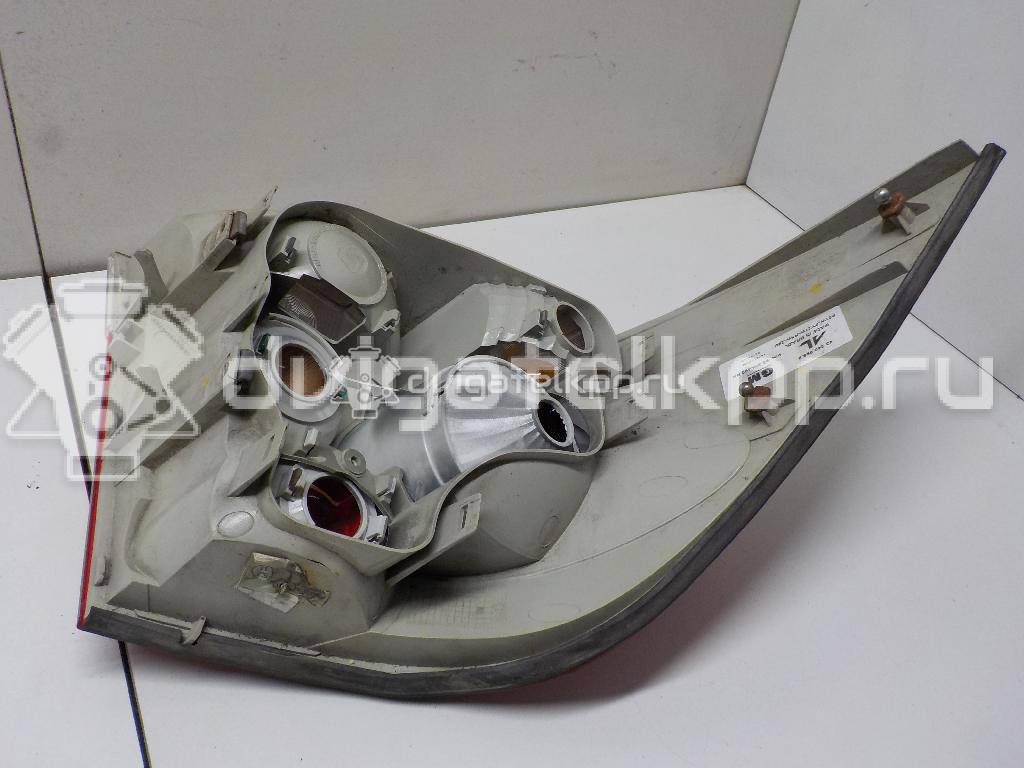 Фото Фонарь задний правый  93345894 для Opel Astra {forloop.counter}}