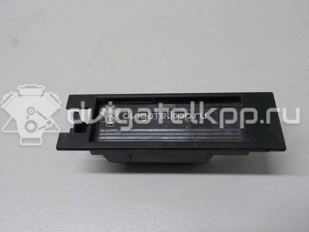 Фото Фонарь подсветки номера  9164143 для Opel Astra / Tigra / Corsa {forloop.counter}}