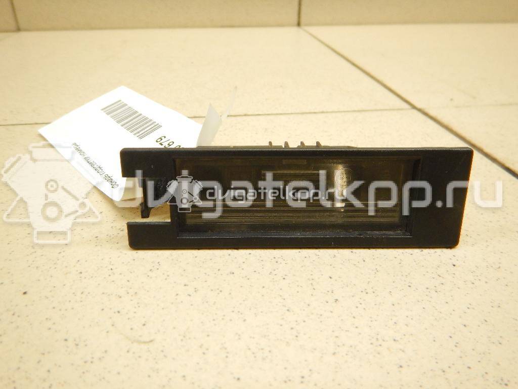 Фото Фонарь подсветки номера  9164143 для Opel Astra / Tigra / Corsa {forloop.counter}}