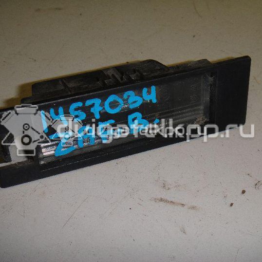 Фото Фонарь подсветки номера  9164143 для Opel Astra / Tigra / Corsa