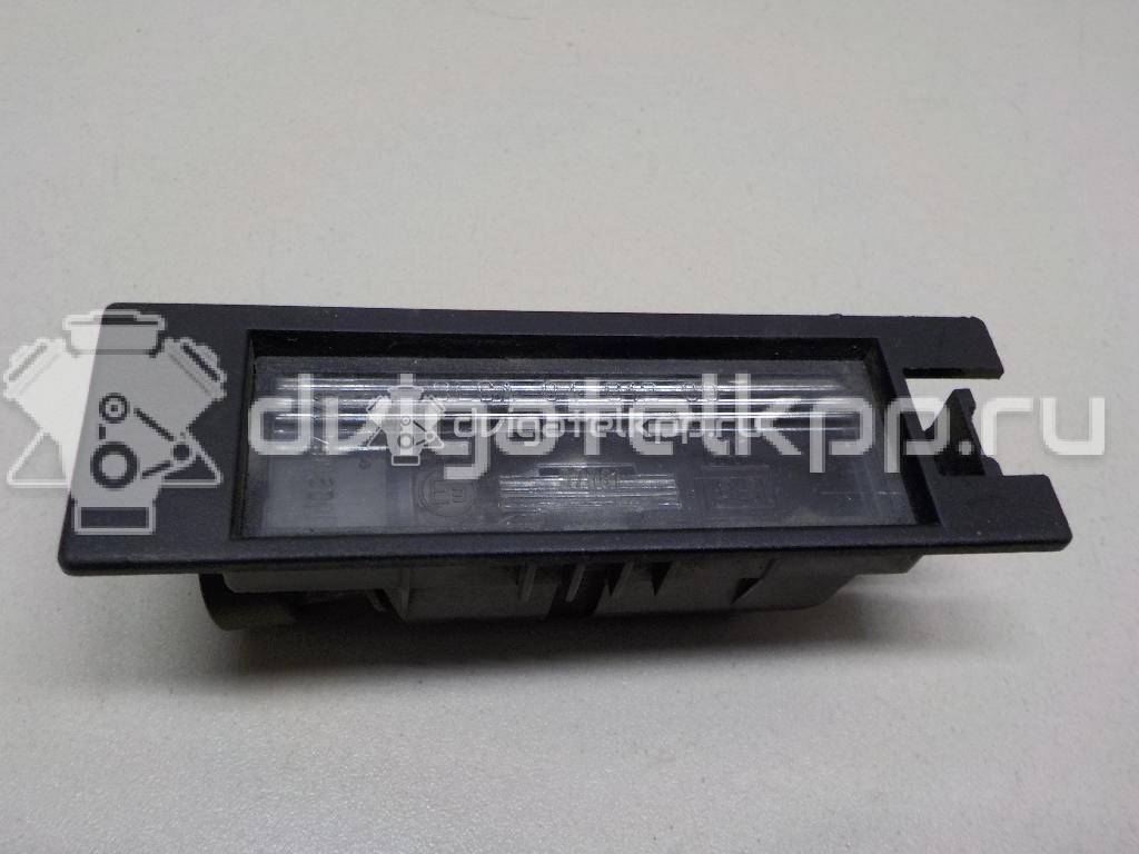 Фото Фонарь подсветки номера  9164143 для Opel Astra / Tigra / Corsa {forloop.counter}}