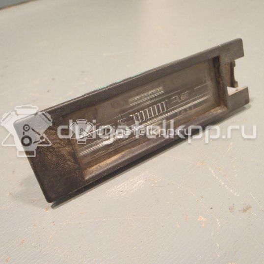 Фото Фонарь подсветки номера  13139990 для Opel Astra / Corsa / Vectra