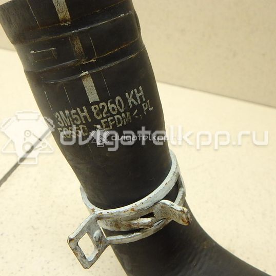 Фото Патрубок радиатора  1386718 для opel Astra H / Family