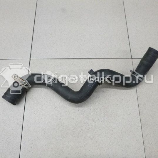 Фото Патрубок радиатора  1386718 для opel Astra H / Family