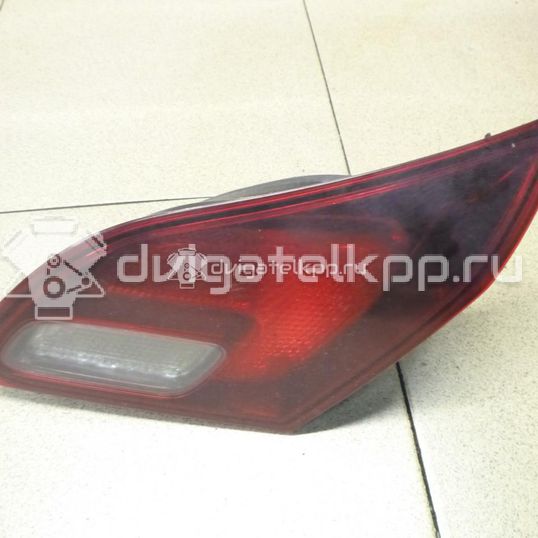 Фото Фонарь задний внутренний правый  13360790 для Opel Astra