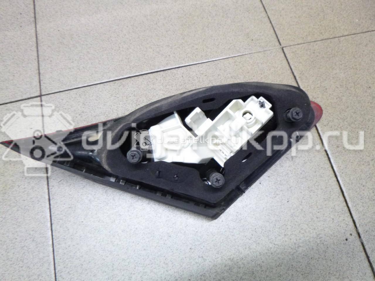 Фото Фонарь задний внутренний правый  13360790 для Opel Astra {forloop.counter}}
