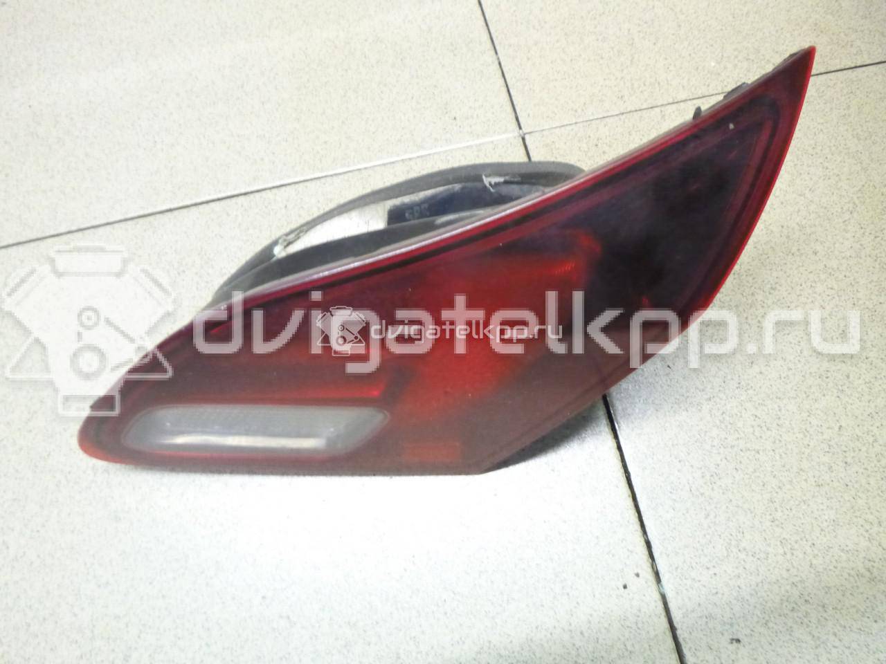 Фото Фонарь задний внутренний правый  13360790 для Opel Astra {forloop.counter}}
