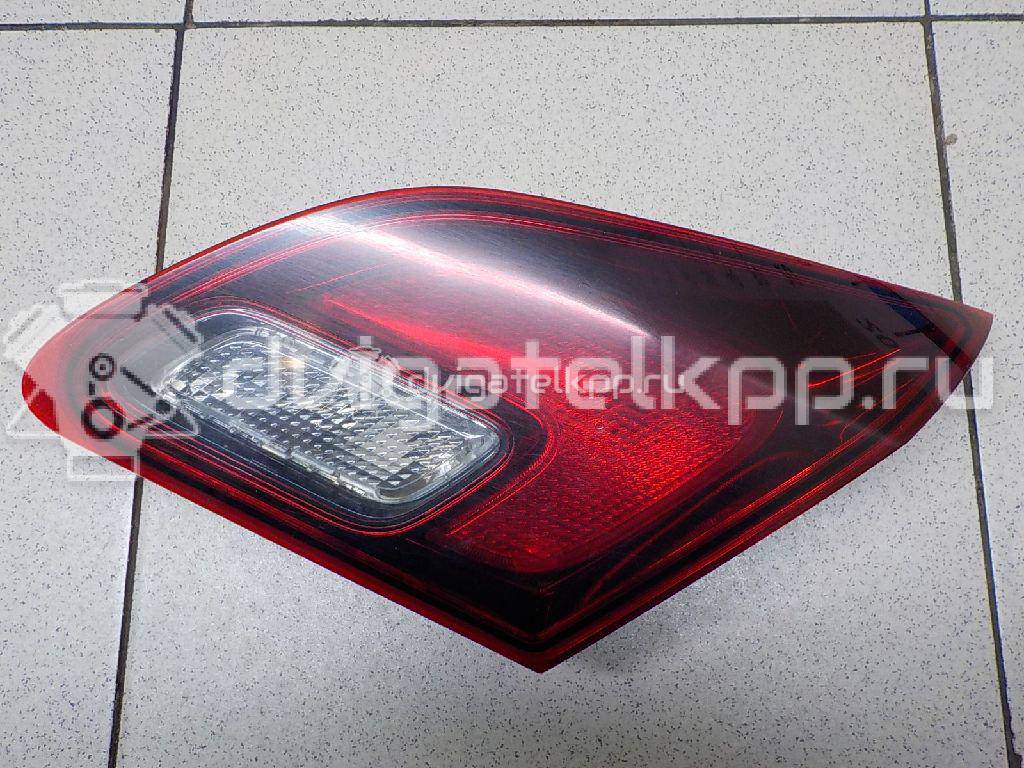Фото Фонарь задний внутренний правый  13360790 для Opel Astra {forloop.counter}}