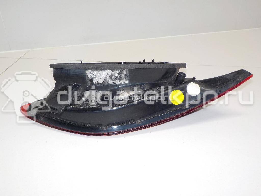 Фото Фонарь задний внутренний правый  13306456 для Opel Astra {forloop.counter}}