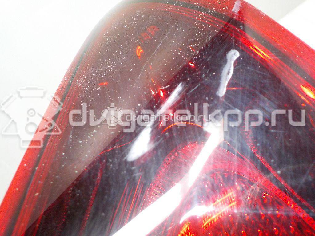 Фото Фонарь задний внутренний правый  13306456 для Opel Astra {forloop.counter}}