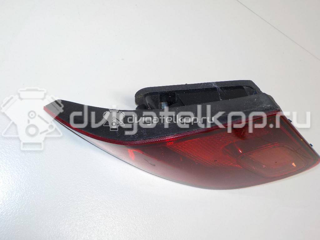 Фото Фонарь задний внутренний правый  13306456 для Opel Astra {forloop.counter}}