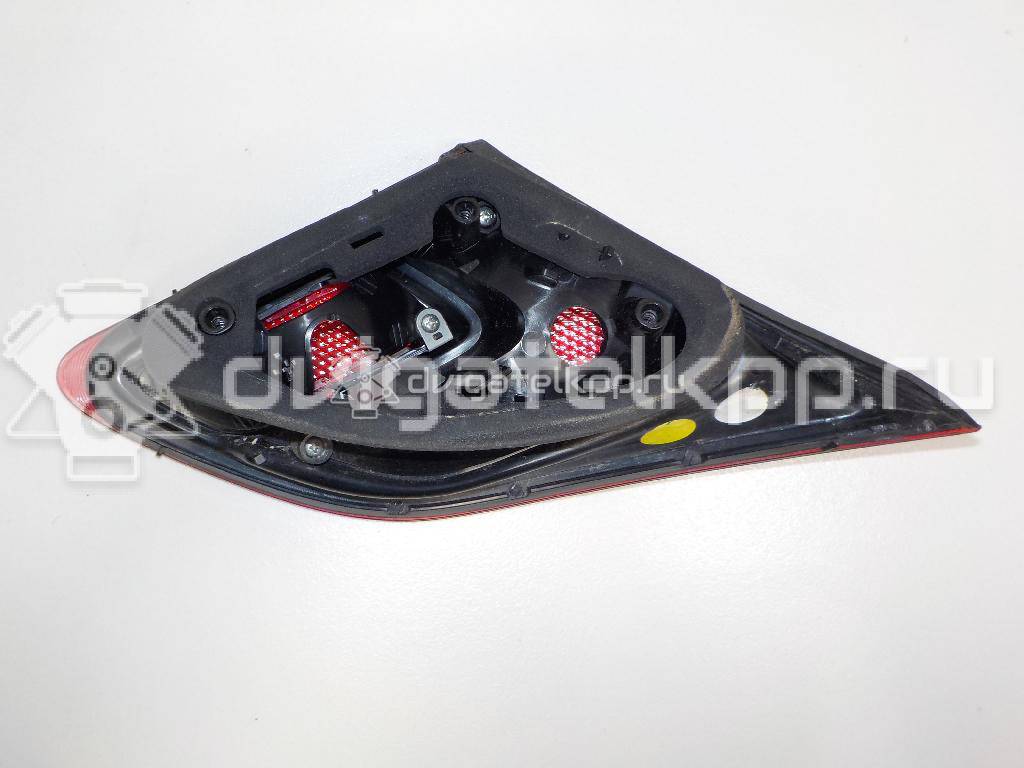 Фото Фонарь задний внутренний правый  13306456 для Opel Astra {forloop.counter}}