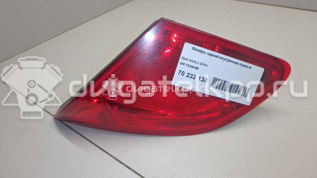 Фото Фонарь задний внутренний правый  13306456 для Opel Astra {forloop.counter}}
