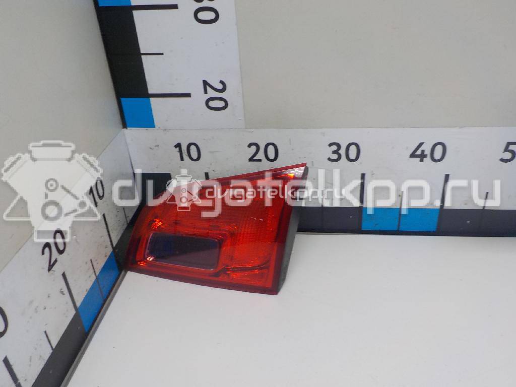 Фото Фонарь задний внутренний правый  13282247 для Opel Astra {forloop.counter}}
