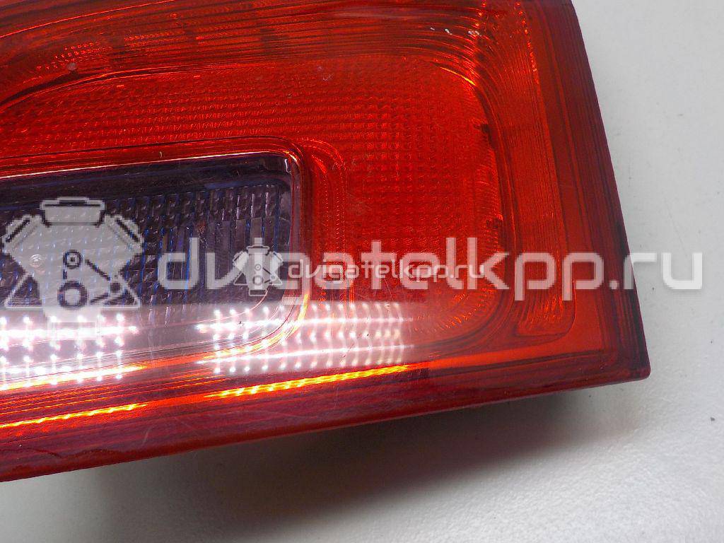 Фото Фонарь задний внутренний правый  13282247 для Opel Astra {forloop.counter}}