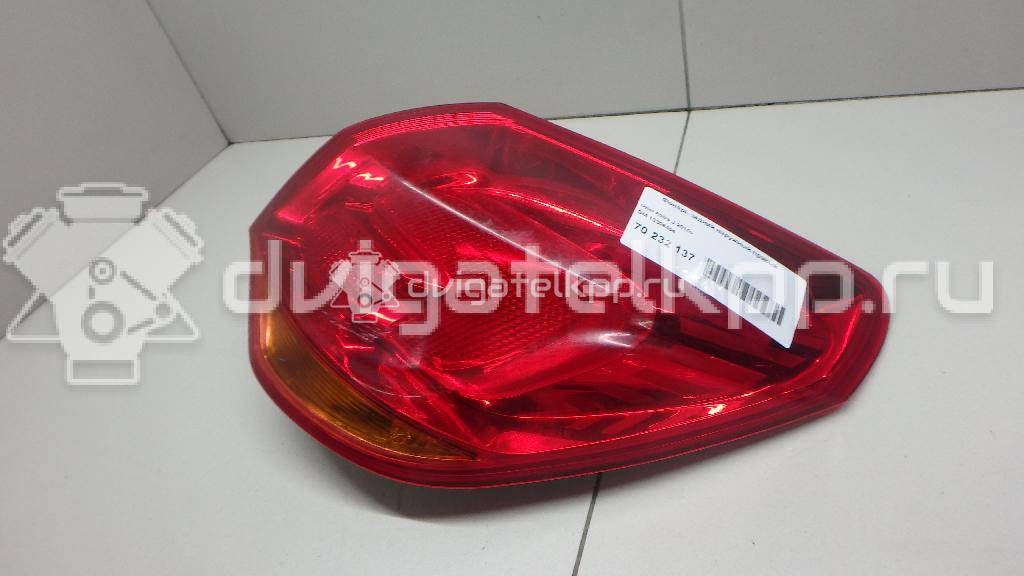 Фото Фонарь задний наружный правый  13306454 для Opel Astra {forloop.counter}}