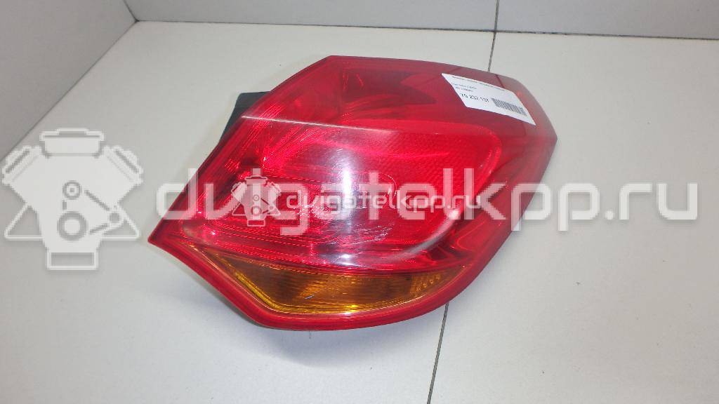 Фото Фонарь задний наружный правый  13306454 для Opel Astra {forloop.counter}}