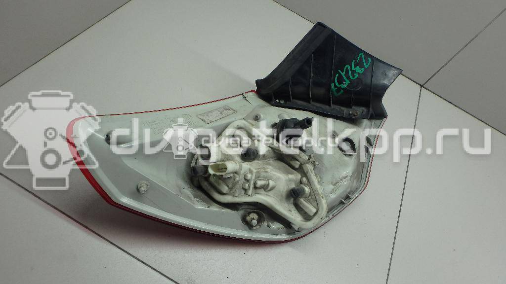 Фото Фонарь задний наружный правый  13306454 для Opel Astra {forloop.counter}}
