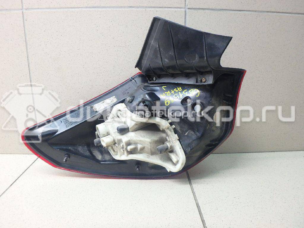 Фото Фонарь задний наружный правый  1222208 для Opel Astra {forloop.counter}}