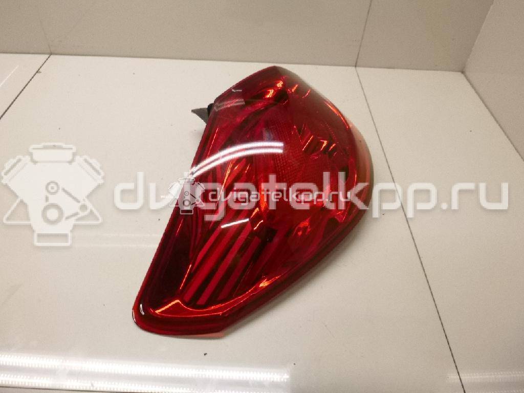 Фото Фонарь задний наружный левый  13306453 для Opel Astra {forloop.counter}}