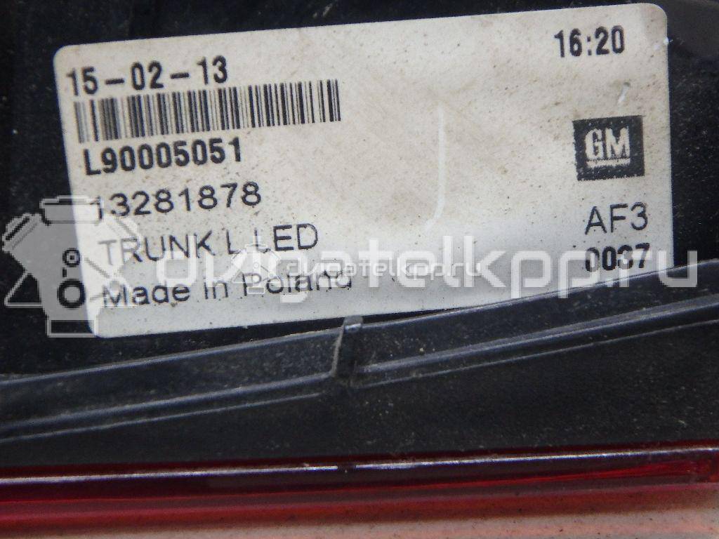 Фото Фонарь задний внутренний левый  13281878 для Opel Astra {forloop.counter}}