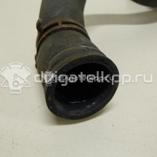 Фото Патрубок радиатора  13251428 для Opel Astra