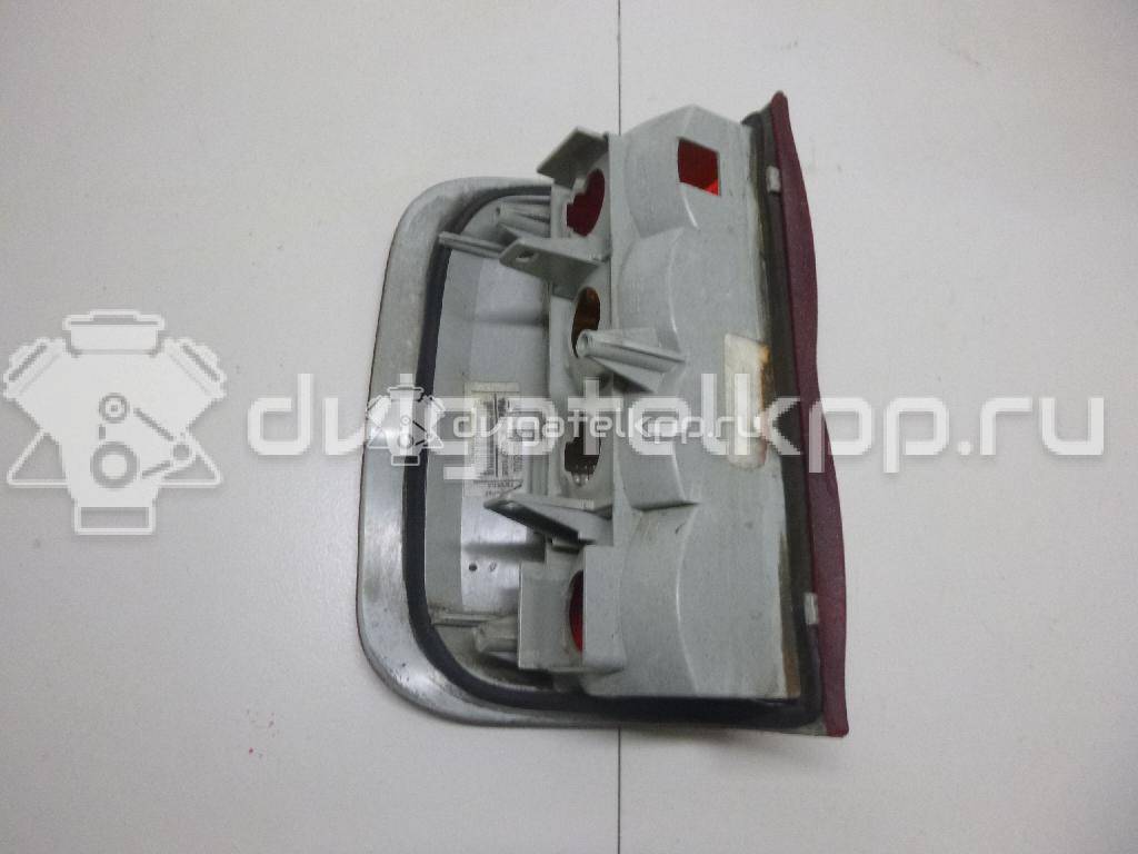 Фото Фонарь задний правый  1223531 для Opel Corsa / Combo {forloop.counter}}