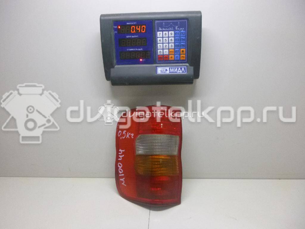 Фото Фонарь задний правый  1223531 для Opel Corsa / Combo {forloop.counter}}