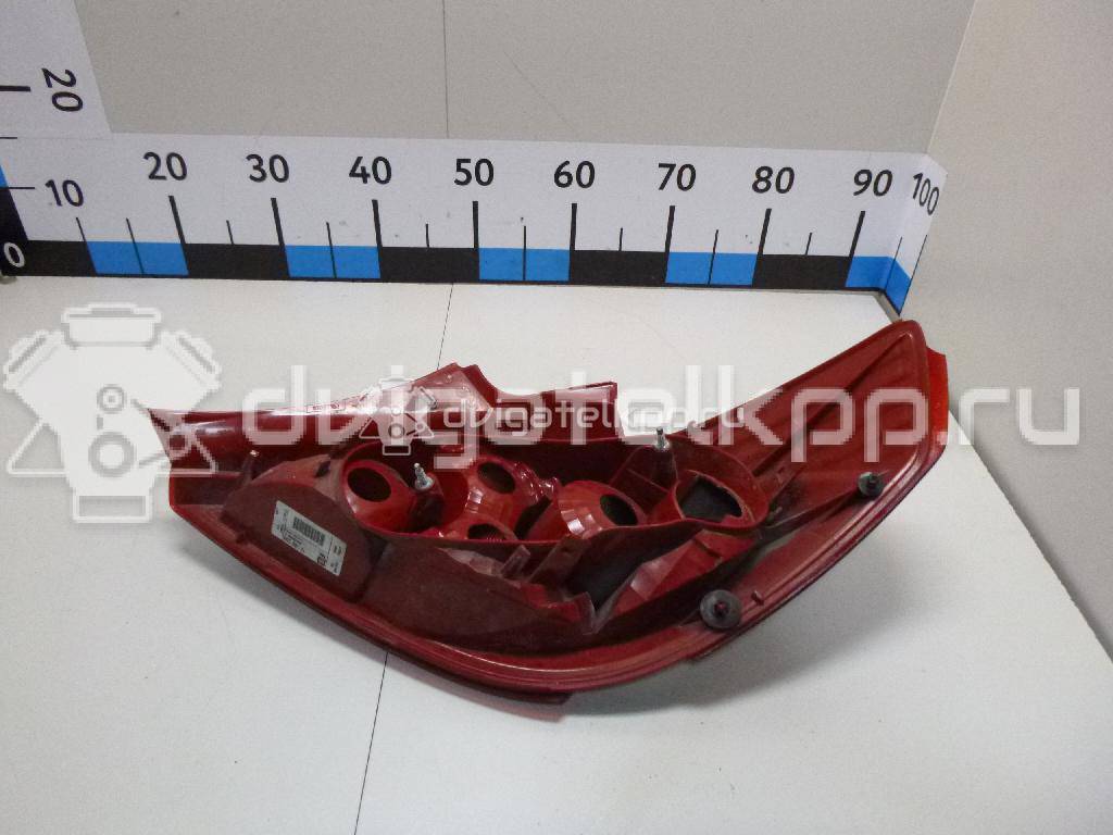 Фото Фонарь задний левый  1222132 для Opel Corsa {forloop.counter}}