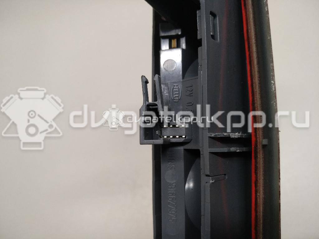 Фото Фонарь задний (стоп сигнал)  13188045 для Opel Corsa {forloop.counter}}