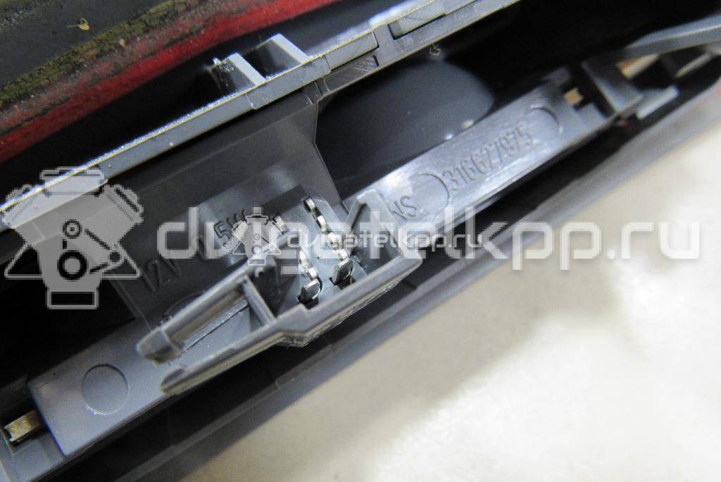 Фото Фонарь задний (стоп сигнал)  13188045 для Opel Corsa {forloop.counter}}