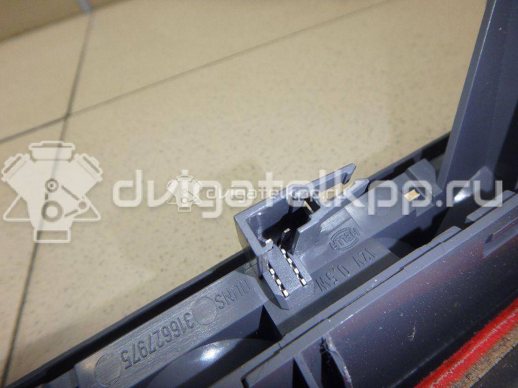 Фото Фонарь задний (стоп сигнал)  13188045 для Opel Corsa {forloop.counter}}