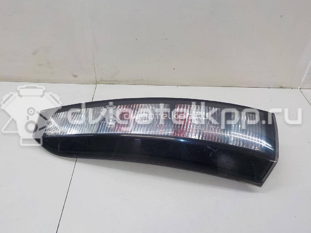 Фото Фонарь задний левый  1222133 для Opel Meriva {forloop.counter}}