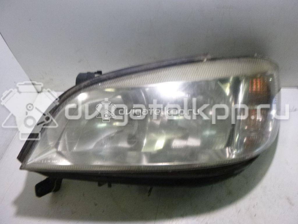 Фото Фара левая  1216277 для Opel Zafira {forloop.counter}}