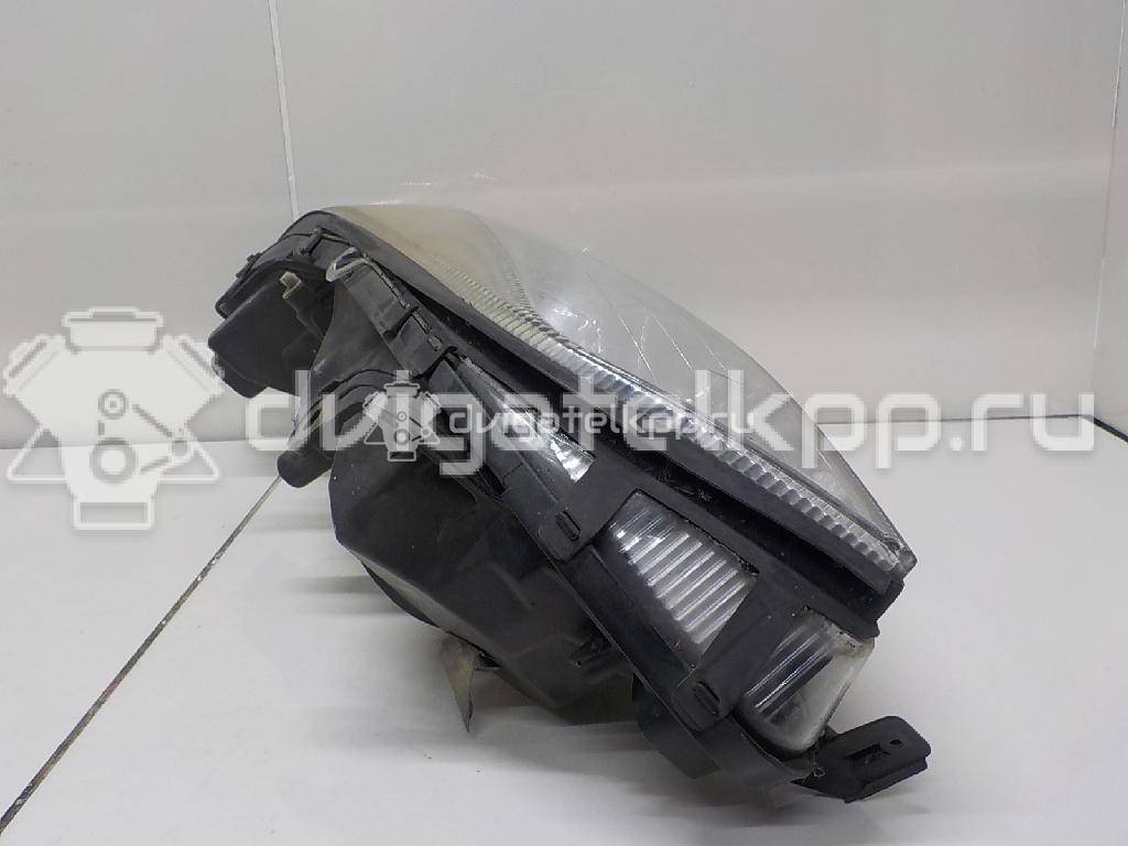 Фото Фара левая  1216279 для Opel Zafira {forloop.counter}}