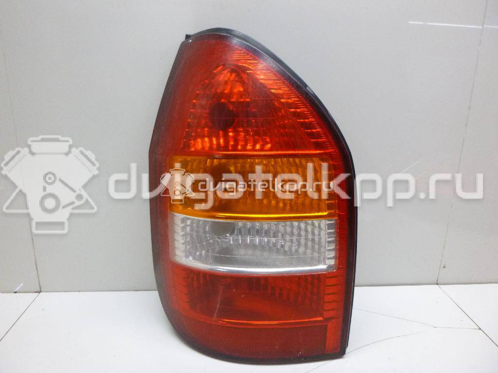 Фото Фонарь задний левый  6223027 для Opel Zafira {forloop.counter}}