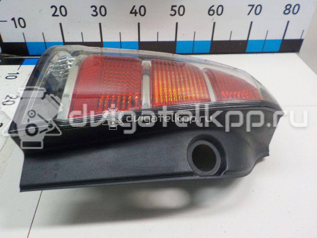 Фото Фонарь задний левый  93183065 для Opel Zafira {forloop.counter}}
