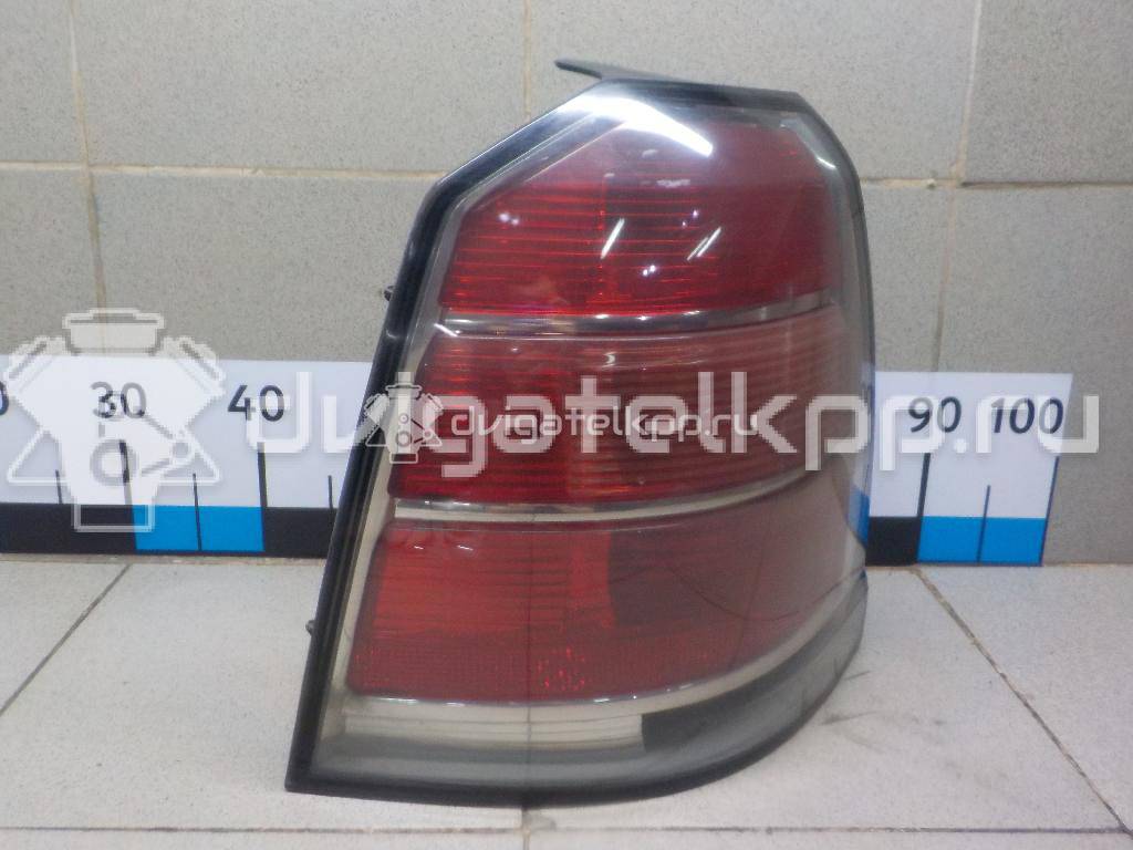 Фото Фонарь задний левый  1222119 для Opel Zafira {forloop.counter}}